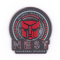 Pin escudo N.E.S.T. Transformers